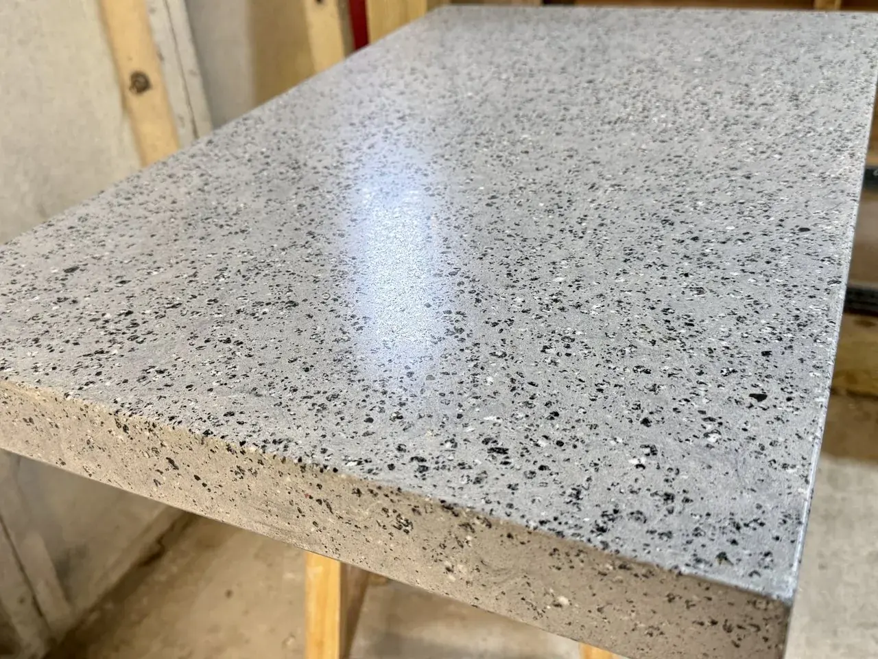 Polished grey salt and pepper concrete worktop edge in the workshop